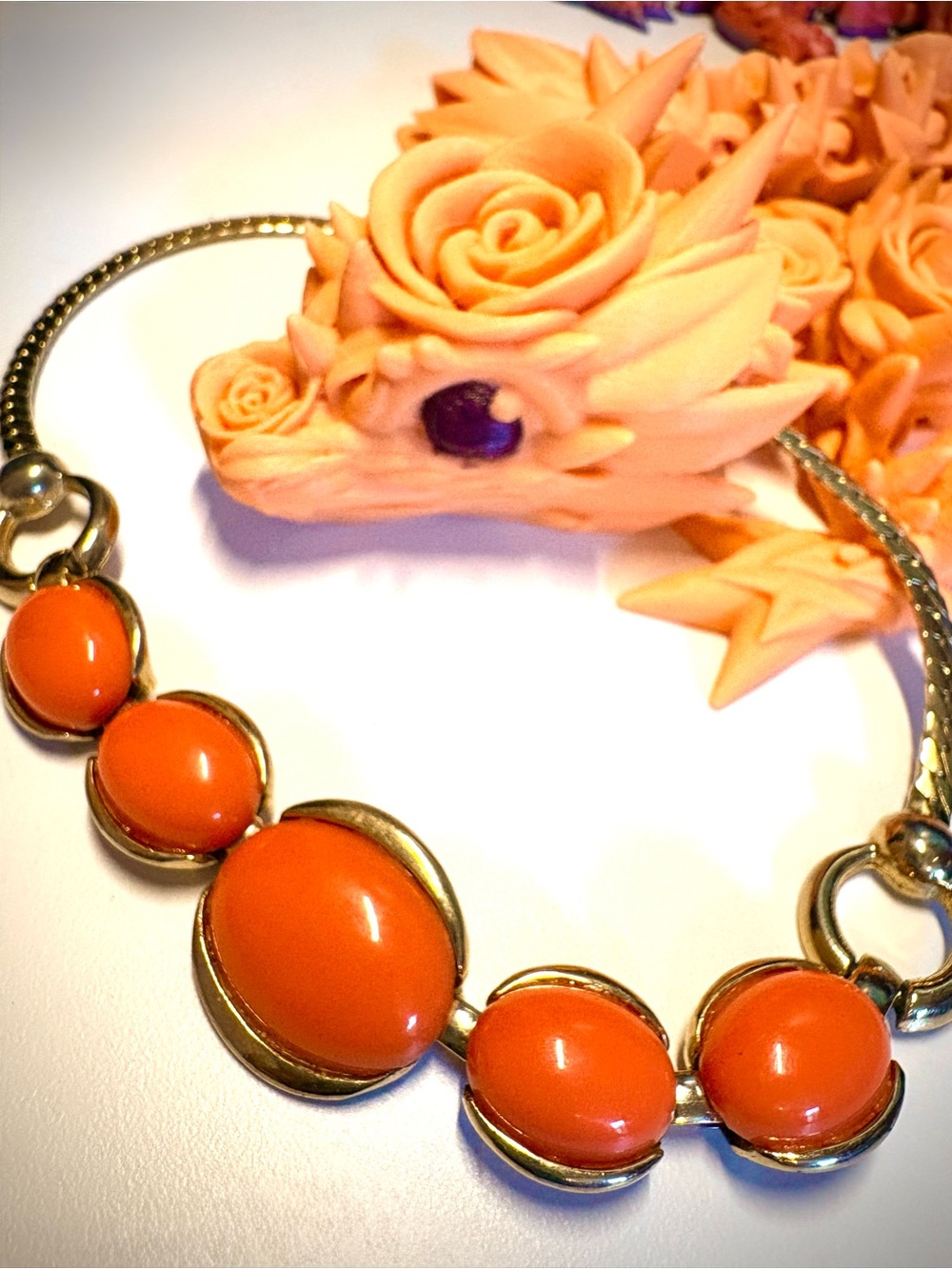 Vintage salmon colored lucite necklace